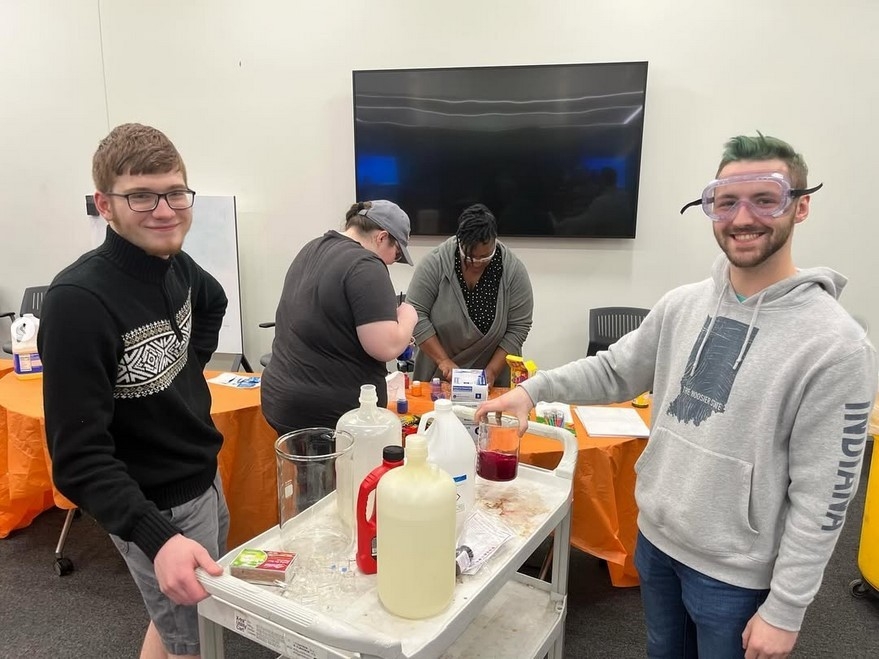 NKU SAACS members doing chemistry activities together.
