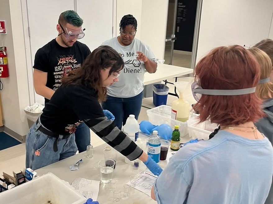 NKU SAACS members doing chemistry activities together.