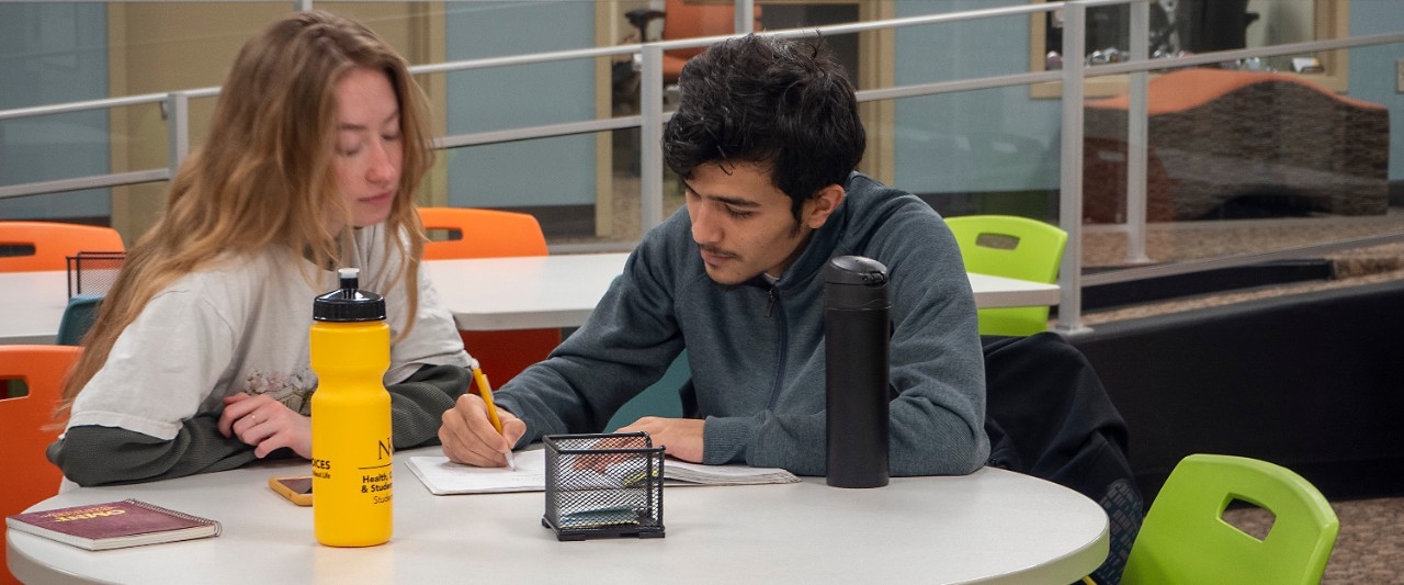NKU student receives mathematics and statistics tutoring from a fellow student.