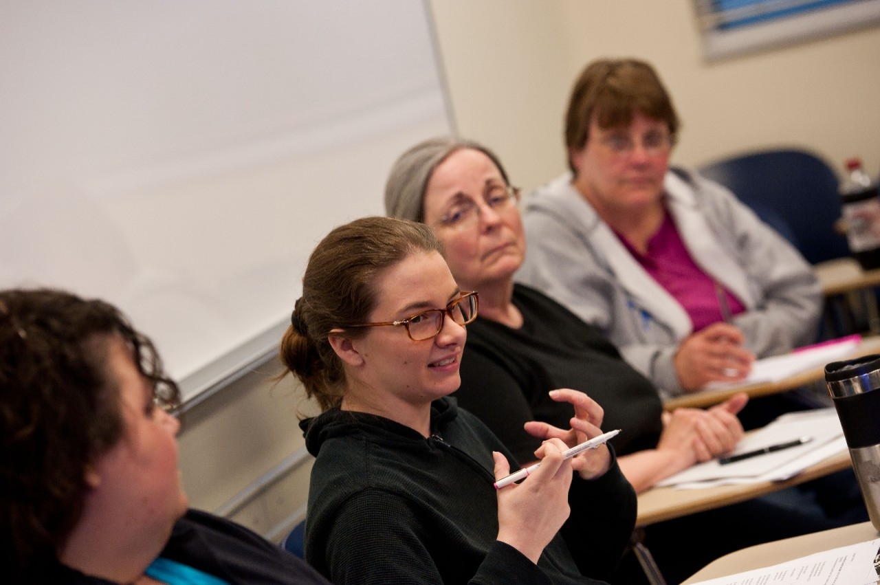Student discussing in a classroom setting