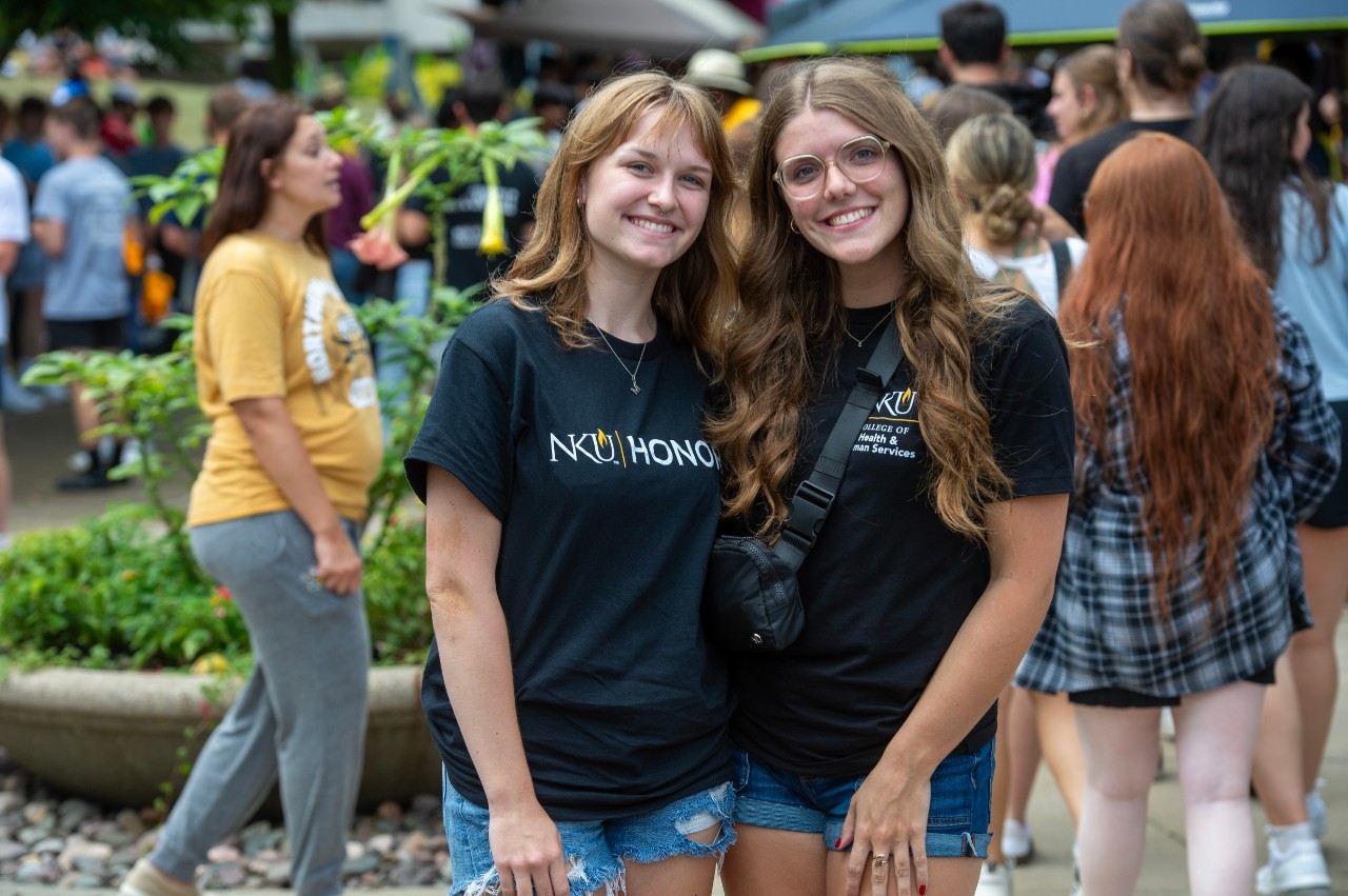 Two female students posing together at Victorfest