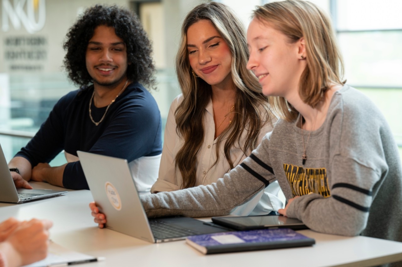 Student smiling at Norse network hub